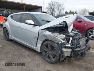 2013 Hyundai Veloster Turbo w/Black Int with VIN KMHTC6AE3DU137543, listed as a IAAI auction lot 41989638 with 130,000 mi miles. Bid and sale history available at carsss.com. Image 1.