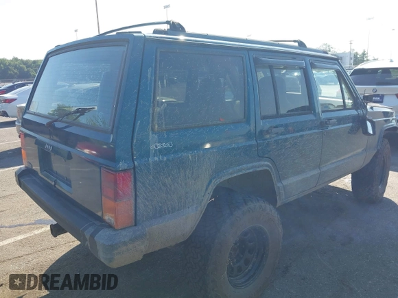 1995 Jeep Cherokee Sport z VIN 1J4FJ68S7SL623451, wystawiony jako IAAI lot #42581407 z przebiegiem 160 581 mil mil oraz . Historia ofert i sprzedaży dostępna na DreamBid. Obrazek 4.