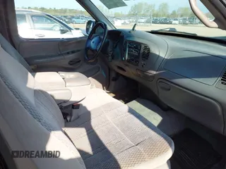 1997 Ford F-150 XL with VIN 1FTDX18W6VKD46643, listed as a IAAI auction lot 42111129 with 107,025 mi miles. Bid and sale history available at carsss.com. Image 5.