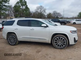 2021 GMC Acadia Denali with VIN 1GKKNPLS1MZ139821, listed as a IAAI auction lot 41455357 with 61,265 mi miles and . Bid and sale history available at carsss.com. Image 13.