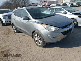 2013 Hyundai Tucson GLS with VIN KM8JU3AC0DU572232, listed as a IAAI auction lot 41724332 with 232,661 mi miles. Bid and sale history available at carsss.com. Image 1.