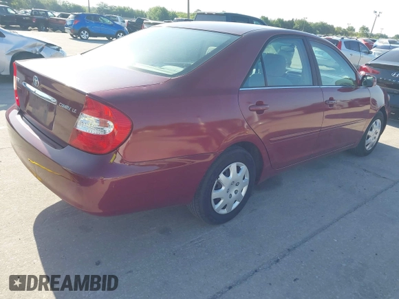 2004 Toyota Camry LE with VIN 4T1BE32KX4U272768, listed as a IAAI auction lot 42006421 with 204,386 mi miles. Bid and sale history available at carsss.com. Image 4.