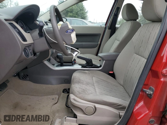 2010 Ford Focus SE with VIN 1FAHP3FN4AW118236, listed as a Copart auction lot 52704925 with 65,989 mi miles and Salvage Title. Bid and sale history available at DreamBid. Image 7.