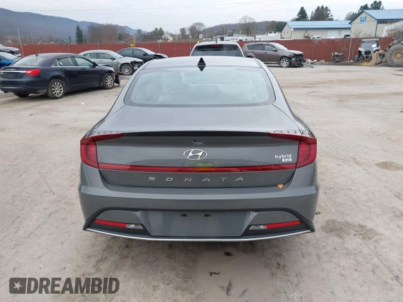 2022 Hyundai Sonata Hybrid Blue with VIN KMHL24JJ2NA048439, listed as a IAAI auction lot 40942477 with 64,855 mi miles. Bid and sale history available at carsss.com. Image 17.