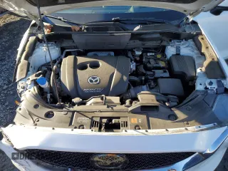 2018 Mazda CX-5 Grand Touring z VIN JM3KFBDM6J0337006, wystawiony jako Copart lot #87155694 z przebiegiem 50 643 mil mil oraz Szkoda całkowita • Salvage title. Historia ofert i sprzedaży dostępna na DreamBid. Obrazek 11.