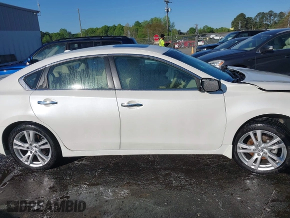 2013 Nissan Altima SV with VIN 1N4BL3AP8DC212068, listed as a IAAI auction lot 42022858 with 67,177 mi miles and . Bid and sale history available at DreamBid. Image 13.