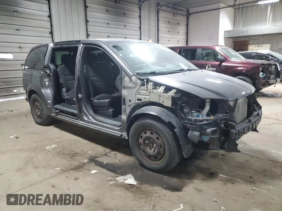 2014 Dodge Grand Caravan SE 30th Anniversary with VIN 2C4RDGBGXER458141, listed as a Copart auction lot 42140345 with 61,776 mi miles and Clean Title. Bid and sale history available at DreamBid. Image 4.