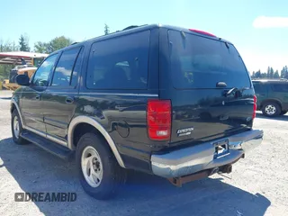 1999 Ford Expedition XLT z VIN 1FMPU18L9XLC40031, wystawiony jako IAAI lot #42722263 z przebiegiem 168 395 mil mil oraz . Historia ofert i sprzedaży dostępna na DreamBid. Obrazek 3.