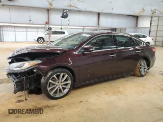 2014 Toyota Avalon Limited with VIN 4T1BK1EB7EU105830, listed as a Copart auction lot 88096505 with 106,626 mi miles and Salvage Title. Bid and sale history available at carsss.com. Image 1.