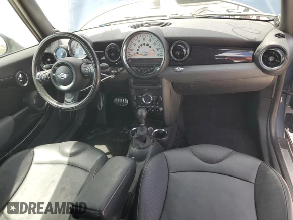 2011 MINI Convertible S with VIN WMWZP3C50BTX83220, listed as a Copart auction lot 61590205 with 80,979 mi miles and Salvage title. Bid and sale history available at DreamBid. Image 8.