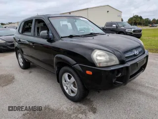 2005 Hyundai Tucson GL with VIN KM8JM12BX5U071182, listed as a Copart auction lot 74852974 with 74,235 mi miles and Salvage Title. Bid and sale history available at carsss.com. Image 4.