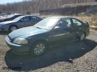 1997 Honda Civic EX with VIN 1HGEJ8142VL136575, listed as a Copart auction lot 49732395 with 296,782 mi miles and Salvage Title. Bid and sale history available at carsss.com. Image 1.