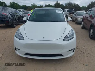 2021 Tesla Model Y Long Range with VIN 5YJYGDEE7MF198867, listed as a IAAI auction lot 42117463 with 79,759 mi miles and . Bid and sale history available at DreamBid. Image 12.