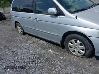 2002 Honda Odyssey EX z VIN 2HKRL18692H526842, wystawiony jako IAAI lot #42495810 z przebiegiem 220 289 mil mil oraz . Historia ofert i sprzedaży dostępna na DreamBid. Obrazek 6.
