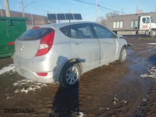 2014 Hyundai Accent GS with VIN KMHCT5AEXEU167098, listed as a IAAI auction lot 41552742 with 48,645 mi miles. Bid and sale history available at carsss.com. Image 4.