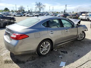 2012 Infiniti M Hybrid with VIN JN1EY1APXCM910481, listed as a Copart auction lot 52943285 with Not Provided miles and Salvage Title. Bid and sale history available at DreamBid. Image 3.