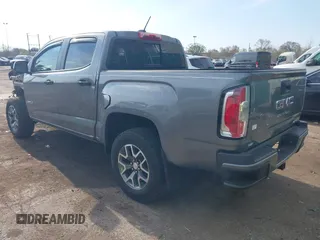 2022 GMC Canyon 4WD AT4 z VIN 1GTG6FEN2N1101756, wystawiony jako IAAI lot #42107148 z przebiegiem 37 900 mil mil oraz . Historia ofert i sprzedaży dostępna na DreamBid. Obrazek 3.