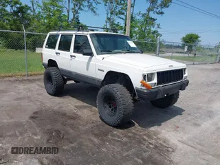 1996 Jeep Cherokee Country with VIN 1J4FJ78SXTL189940, listed as a IAAI auction lot 42020459 with 181,035 mi miles. Bid and sale history available at carsss.com. Image 1.