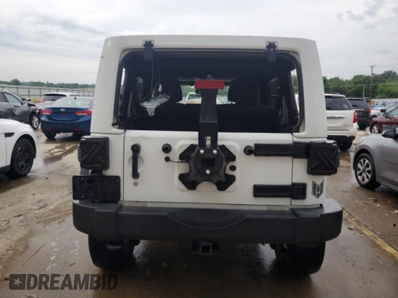 2013 Jeep Wrangler Unlimited Sport z VIN 1C4BJWDG0DL574795, wystawiony jako Copart lot #59230515 z przebiegiem 132 808 mil mil oraz Szkoda całkowita • Salvage title. Historia ofert i sprzedaży dostępna na DreamBid. Obrazek 6.