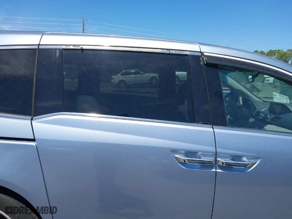 2013 Honda Odyssey Touring with VIN 5FNRL5H94DB069716, listed as a IAAI auction lot 41901369 with 243,492 mi miles. Bid and sale history available at carsss.com. Image 14.