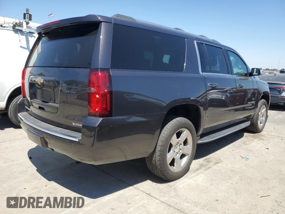 2018 Chevrolet Suburban Premier with VIN 1GNSCJKC4JR189639, listed as a Copart auction lot 64221035 with 110,256 mi miles and Salvage title. Bid and sale history available at DreamBid. Image 3.