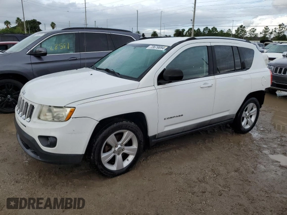 2011 Jeep Compass with VIN 1J4NT1FB8BD138161, listed as a Copart auction lot 73679894 with 199,735 mi miles and Salvage Title. Bid and sale history available at carsss.com. Image 1.