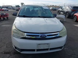 2010 Ford Focus SE with VIN 1FAHP3FN5AW146403, listed as a IAAI auction lot 40955575 with 128,243 mi miles. Bid and sale history available at carsss.com. Image 13.