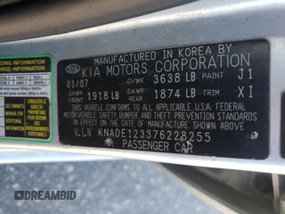 2007 Kia Rio LX with VIN KNADE123376228255, listed as a Copart auction lot 82205954 with 178,823 mi miles and Salvage Title. Bid and sale history available at carsss.com. Image 12.
