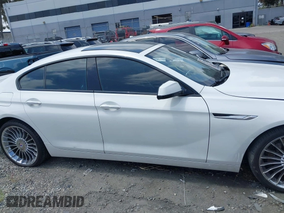 2015 BMW 6 Series 650i xDrive with VIN WBA6B4C53FD899938, listed as a IAAI auction lot 41761114 with 93,015 mi miles and . Bid and sale history available at carsss.com. Image 13.