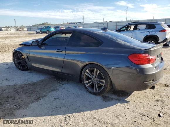2015 BMW 4 Series 435i xDrive with VIN WBA3R5C56FK371987, listed as a Copart auction lot 88077015 with 0 mi miles and Salvage Title. Bid and sale history available at carsss.com. Image 2.