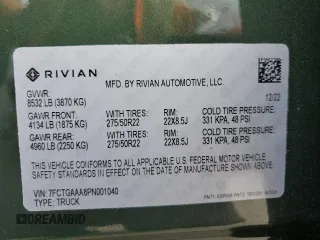 2023 Rivian R1T Adventure z VIN 7FCTGAAA8PN001040, wystawiony jako Copart lot #71517874 z przebiegiem 19 789 mil mil oraz Szkody całkowita. Historia ofert i sprzedaży dostępna na DreamBid. Obrazek 13.