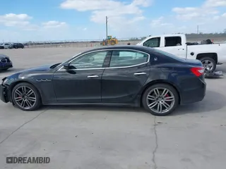2017 Maserati Ghibli with VIN ZAM57XSA6H1218753, listed as a IAAI auction lot 41833235 with 42,135 mi miles. Bid and sale history available at carsss.com. Image 14.