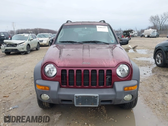 2002 Jeep Liberty Sport with VIN 1J4GL48K12W270609, listed as a IAAI auction lot 42062257 with 120,667 mi miles. Bid and sale history available at carsss.com. Image 6.
