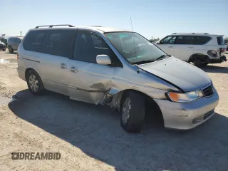 2003 Honda Odyssey EX-L with VIN 5FNRL18903B145567, listed as a Copart auction lot 47925695 with 294,627 mi miles and Salvage Title. Bid and sale history available at DreamBid. Image 4.