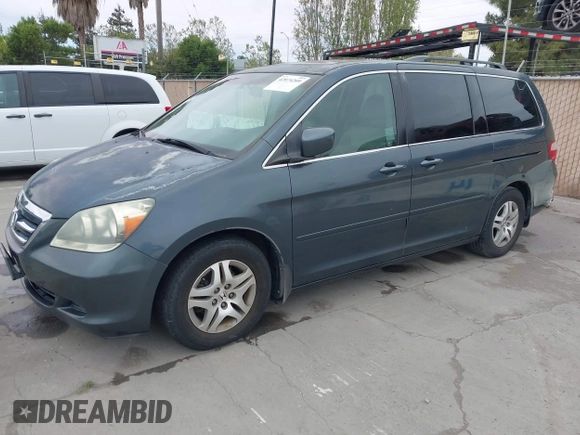 2006 Honda Odyssey EX-L with VIN 5FNRL38786B019441, listed as a IAAI auction lot 42074209 with 184,008 mi miles. Bid and sale history available at carsss.com. Image 2.