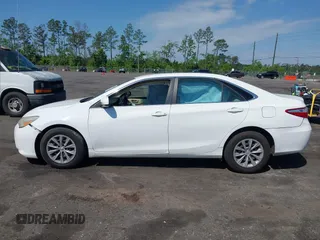 2015 Toyota Camry XLE with VIN 4T1BF1FK6FU948938, listed as a IAAI auction lot 42023487 with 107,232 mi miles. Bid and sale history available at carsss.com. Image 14.