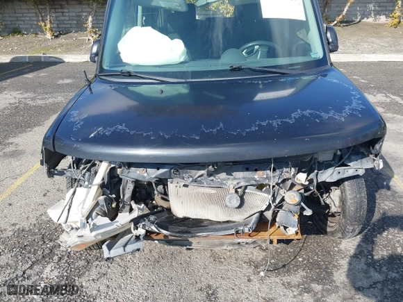 2004 Scion xB with VIN JTLKT324840149980, listed as a IAAI auction lot 41670229 with 193,674 mi miles. Bid and sale history available at carsss.com. Image 6.