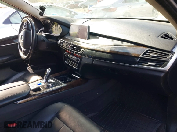 2014 BMW X5 xDrive35i with VIN 5UXKR0C55E0K47655, listed as a IAAI auction lot 41643776 with 154,380 mi miles. Bid and sale history available at carsss.com. Image 5.