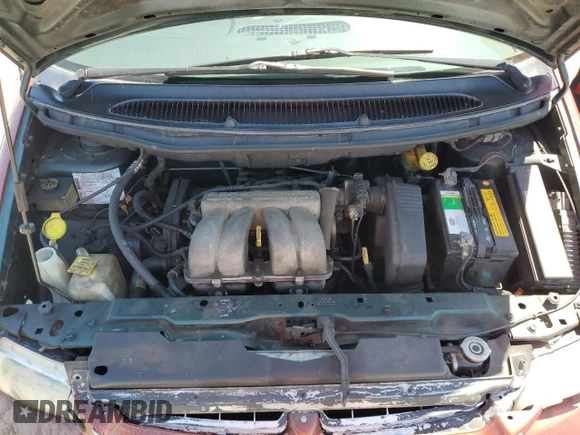 1999 Dodge Caravan with VIN 2B4FP25B0XR192013, listed as a Copart auction lot 55006624 with 195,008 mi miles and Salvage title. Bid and sale history available at DreamBid. Image 12.