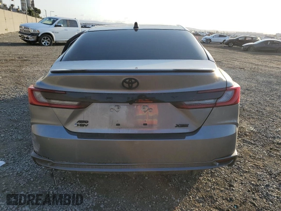 2025 Toyota Camry LE с VIN 4T1DBADK2SU510631, выставлен на аукционе Copart как лот 43218885 с пробегом 10 039 миль миль и Списание • Salvage title. История ставок и продаж доступна на DreamBid. Изображение 6.