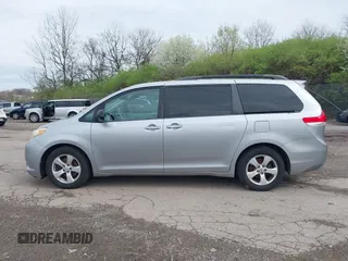 2012 Toyota Sienna LE AAS with VIN 5TDKK3DC9CS227584, listed as a IAAI auction lot 41972758 with 258,077 mi miles. Bid and sale history available at carsss.com. Image 15.