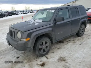 2015 Jeep Patriot North with VIN 1C4NJRAB7FD311725, listed as a Copart auction lot 82647074 with 185,560 mi miles and Salvage Title. Bid and sale history available at carsss.com. Image 1.