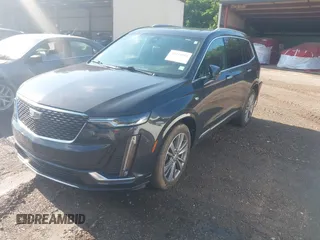2020 Cadillac XT6 FWD Premium Luxury with VIN 1GYKPCRS0LZ206567, listed as a IAAI auction lot 42254511 with 80,443 mi miles and . Bid and sale history available at DreamBid. Image 18.