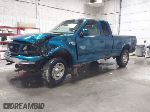 2000 Ford F-150 XL z VIN 1FTRX18L7YKB27657, wystawiony jako IAAI lot #42262373 z przebiegiem Nie podano mil oraz . Historia ofert i sprzedaży dostępna na DreamBid. Obrazek 17.