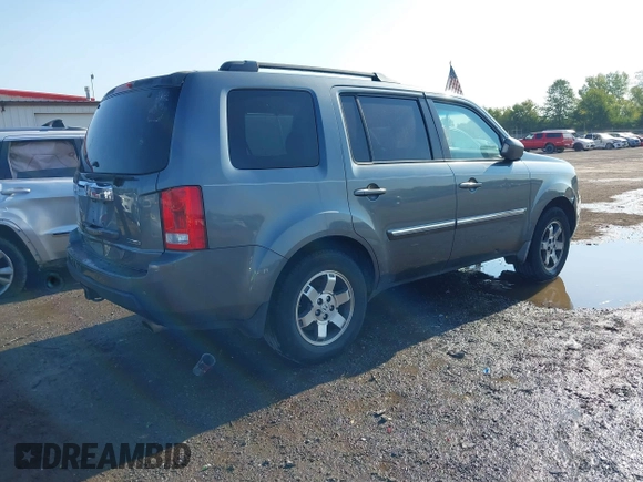 2010 Honda Pilot Touring with VIN 5FNYF3H87AB006023, listed as a IAAI auction lot 40310546 with 135,482 mi miles and . Bid and sale history available at carsss.com. Image 4.