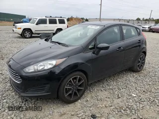 2018 Ford Fiesta SE with VIN 3FADP4EJ9JM105808, listed as a Copart auction lot 87927755 with 104,055 mi miles and Salvage Title. Bid and sale history available at DreamBid. Image 1.