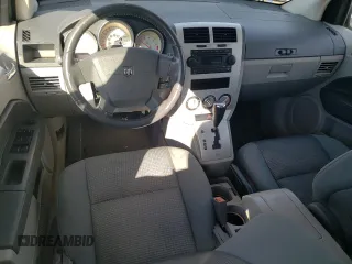 2007 Dodge Caliber R/T z VIN 1B3HB78K07D243730, wystawiony jako Copart lot #87064294 z przebiegiem 201 196 mil mil oraz Tytuł czysty. Historia ofert i sprzedaży dostępna na DreamBid. Obrazek 8.