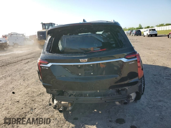 2024 Cadillac XT6 FWD Premium Luxury with VIN 1GYKPCRS7RZ709179, listed as a Copart auction lot 52251305 with 19,442 mi miles and Salvage title. Bid and sale history available at DreamBid. Image 6.