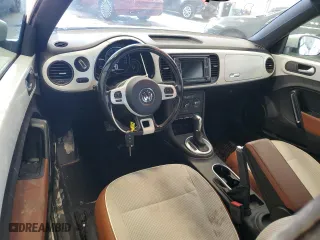 2017 Volkswagen Beetle 1.8T S with VIN 3VWF17AT5HM617358, listed as a Copart auction lot 66074204 with 95,588 mi miles and Salvage Title. Bid and sale history available at carsss.com. Image 8.