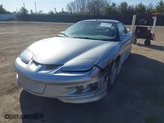 1998 Pontiac Firebird with VIN 2G2FS22K2W2211663, listed as a IAAI auction lot 41790845 with 237,098 mi miles. Bid and sale history available at carsss.com. Image 2.
